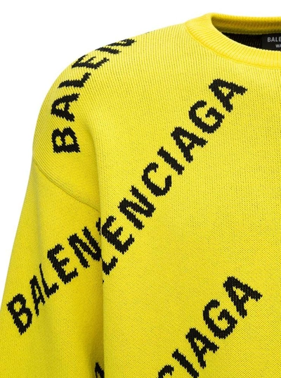 Shop Balenciaga Cotton Sweater With Allover Logo In Yellow