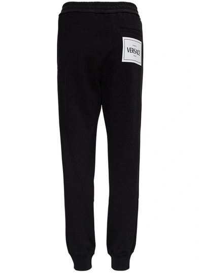 Shop Versace Black Jersey Jogger With Rear Logo Print