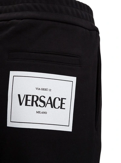 Shop Versace Black Jersey Jogger With Rear Logo Print