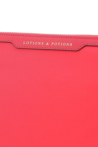 Shop Anya Hindmarch Lotions And Potions Pouch In Hot Pink