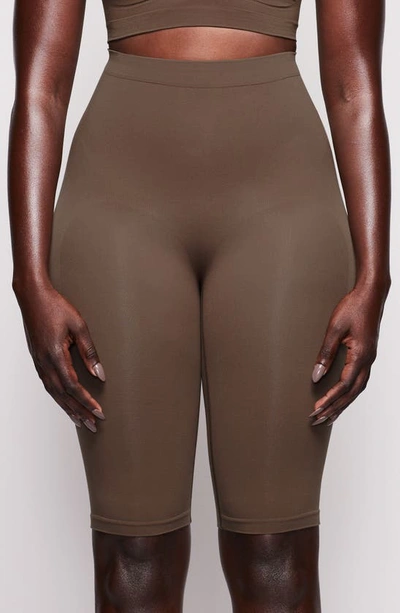 Shop Skims Sculpting Above The Knee Shorts In Oxide