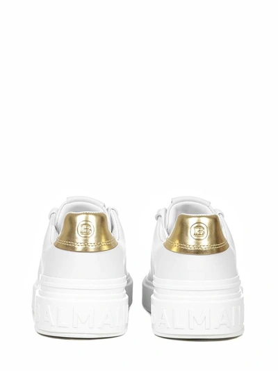 Shop Balmain Sneakers In Bianco Oro