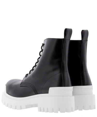 Shop Balenciaga "strike" Military Boots In Black  