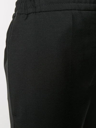 Shop Acne Studios Trousers Black