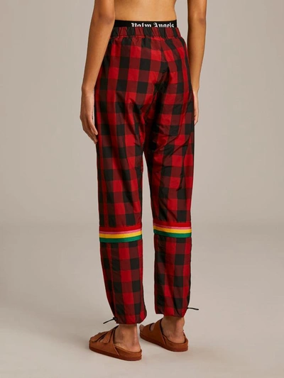 Shop Palm Angels Trousers Red