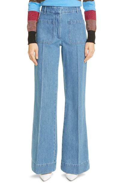 Shop Victoria Beckham High Waist Patch Pocket Wide Leg Jeans In All Over 70s Wash