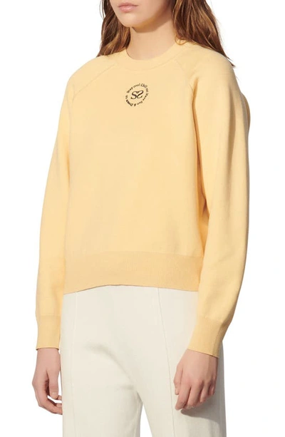 Shop Sandro Positive Message Crewneck Sweater In Light Yellow