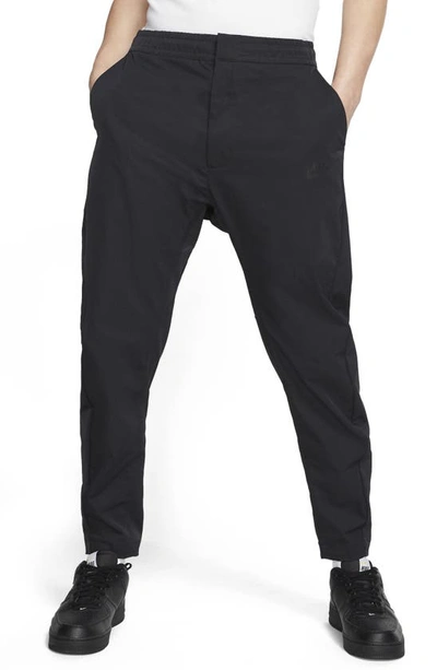Shop Nike Sportswear Woven Pants In Black/ Black