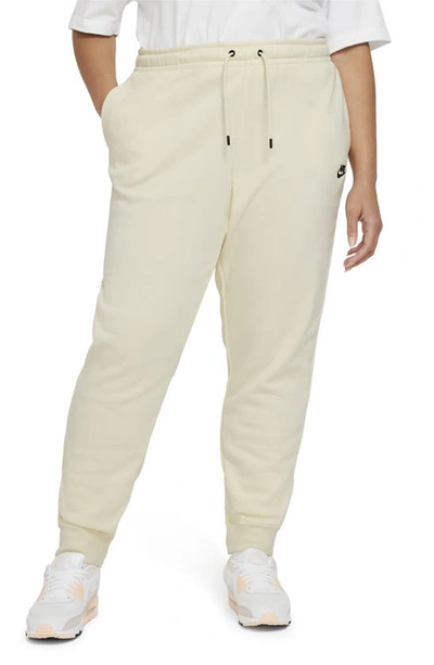 Shop Nike Sportswear Essential Fleece Pants In Coconut Milk/ Black