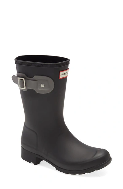 Shop Hunter Original Tour Short Packable Rain Boot In Black/ Mere Rubber