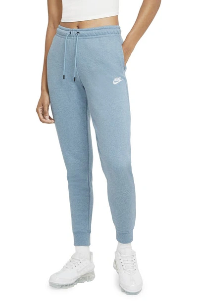 Shop Nike Sportswear Essential Fleece Pants In Cerulean/ Heather/ White