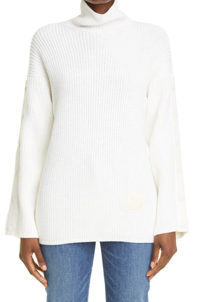 Shop Moncler Snap Sleeve Wool Turtleneck Sweater In 030 White