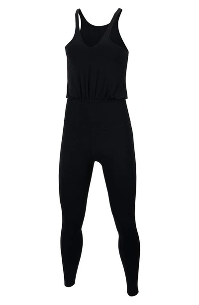 Shop Nike Yoga Jumpsuit In Black/ Dk Smoke Grey