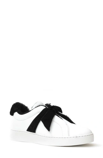 Shop Alexandre Birman Clarita Bow Genuine Shearling Lined Sneaker In White/ Black