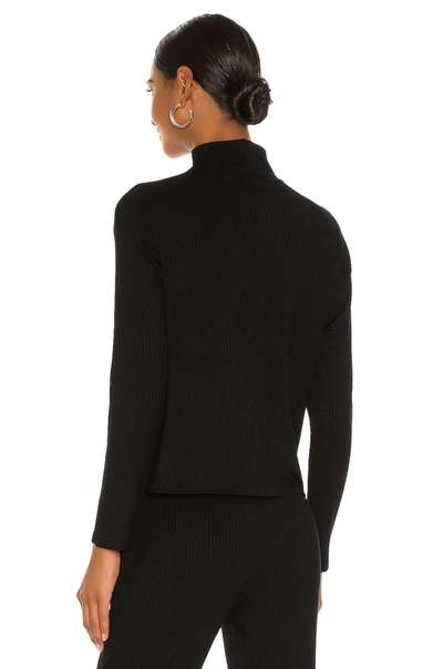 Shop Enza Costa Viscose Rib Cropped Turtleneck In Black