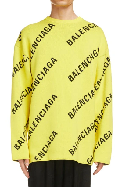 Shop Balenciaga Logo Intarsia Oversize Crewneck Sweater In Yellow