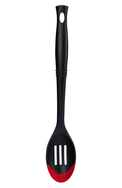 Shop Le Creuset Bi-material Slotted Spoon In Cherry