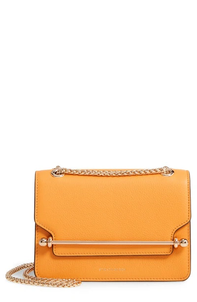 Shop Strathberry Mini East/west Leather Crossbody Bag In Blossom Yellow