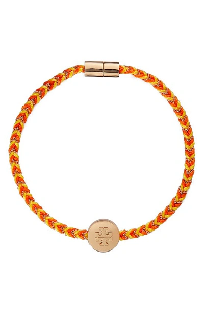 Shop Tory Burch Kira Braided Charm Bracelet In Tory Gold/goldfinch/orange