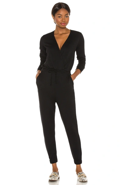 Shop Beyond Yoga Overlapping Jumpsuit In Black