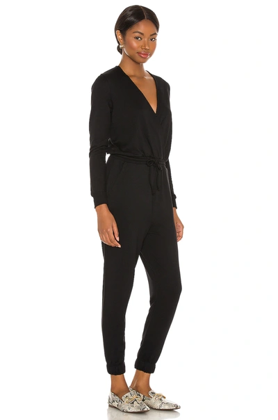 Shop Beyond Yoga Overlapping Jumpsuit In Black