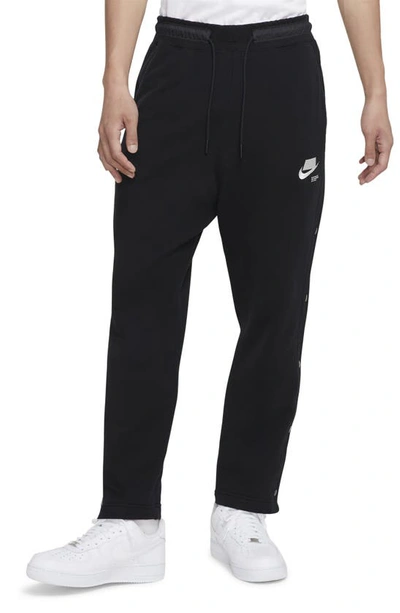 Shop Nike Sportswear Track Pants In Black/ Light Bone