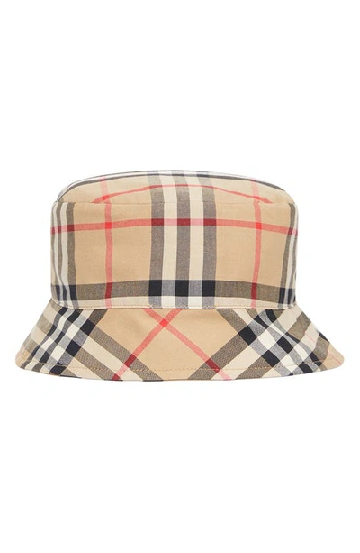 Shop Burberry Kids' Kurt Vintage Check & Icon Stripe Reversible Bucket Hat In Archive Beige Ip Chk
