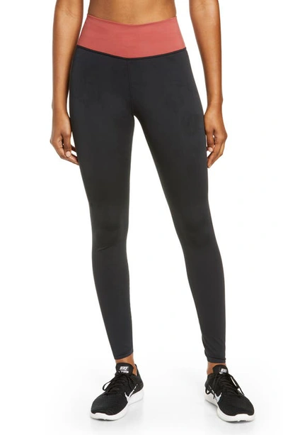 Shop Nike One Luxe Tights In Black/ Canyon Rust/ Clear