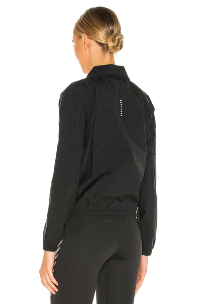 Shop Nike Swoosh Run Jacket In Black & White