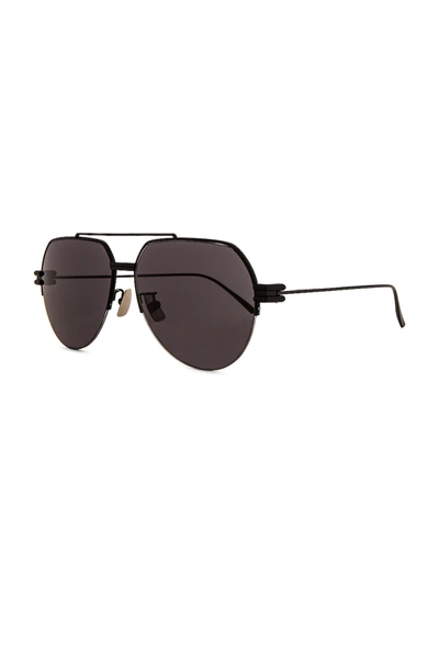 Shop Bottega Veneta Lock Pilot Sunglasses In Shiny Black & Grey