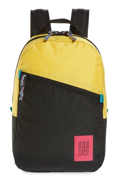 Shop Topo Designs Light Backpack In Yellow/ Black