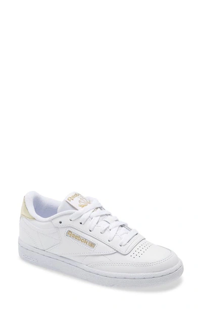 Shop Reebok Club C 85 Sneaker In White/ Gold/ White