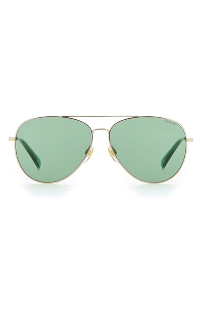 Shop Levi's 58mm Aviator Sunglasses In Gold Green/ Green
