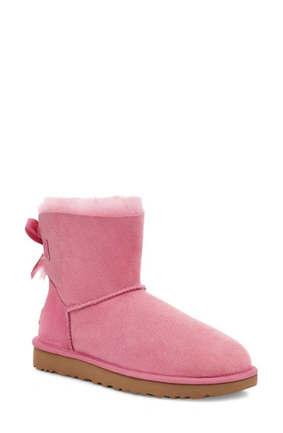 Shop Ugg Mini Bailey Bow Ii Genuine Shearling Bootie In Wild Berry Suede