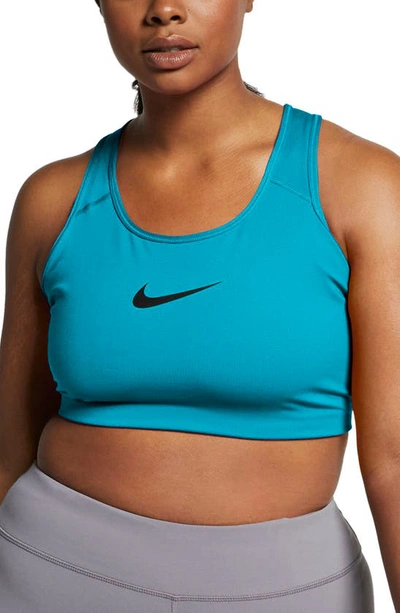 Shop Nike Dry Swoosh Bold Sports Bra In Laser Blue/ Black