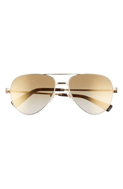 Shop Valentino 57mm Polarized Aviator Sunglasses In Gold/ Brown Gold Grad Mirr
