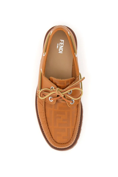 Shop Fendi Ff Leather Boat Loafers In Cuoio