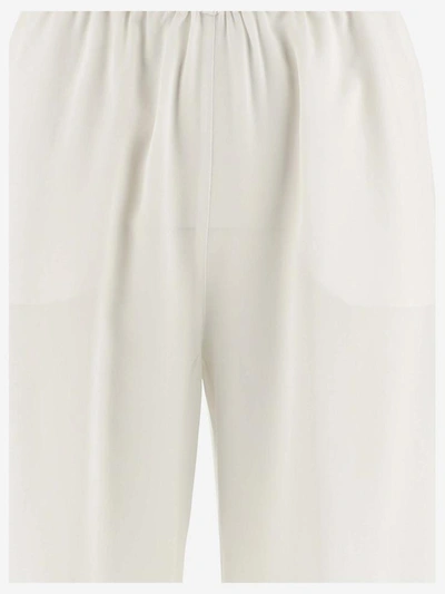 Shop Aspesi Trousers In Bianco