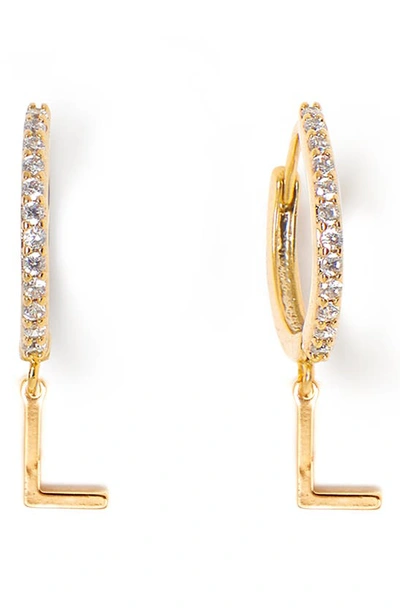 Shop Tess + Tricia Initial Huggie Hoop Earrings In Gold L