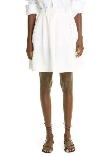 Shop Khaite Isabelle Pleated Woven Shorts In Ivory
