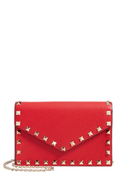 Shop Valentino Rockstud Calfskin Leather Envelope Pouch In Rosso