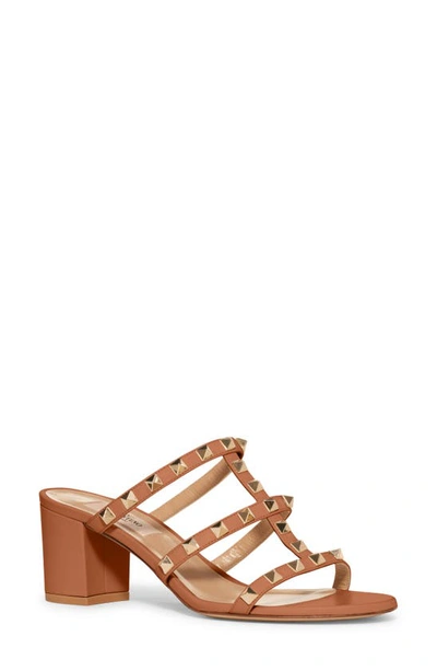 Shop Valentino Rockstud Slide Sandal In Tobacco