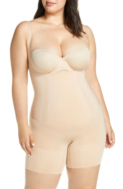 Shop Spanxr Oncore Open-bust Mid-thigh Bodysuit In Soft Nude