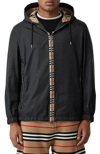 Shop Burberry Everton Icon Stripe Nylon Hooded Jacket In Black