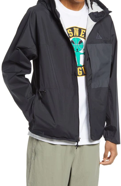 Shop Nike Acg Tuff Nuggets Packable Rain Jacket In Black/ Anthracite