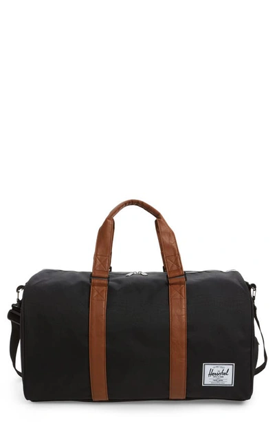 Shop Herschel Supply Co Duffle Bag In Black/ Tan