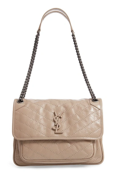Shop Saint Laurent Medium Niki Leather Shoulder Bag In Gold Sand