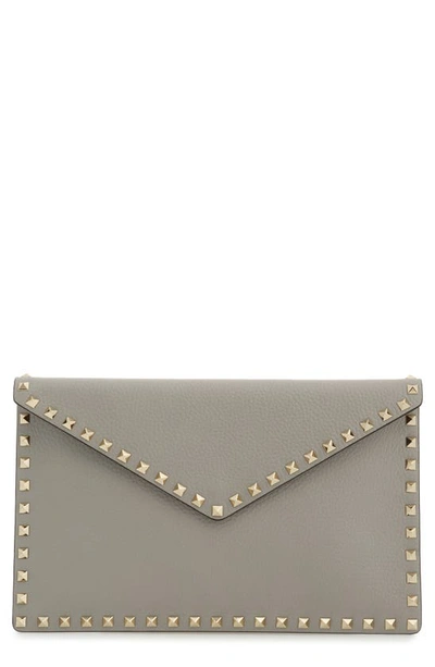 Shop Valentino Large Rockstud Leather Pouch In Pastel Grey