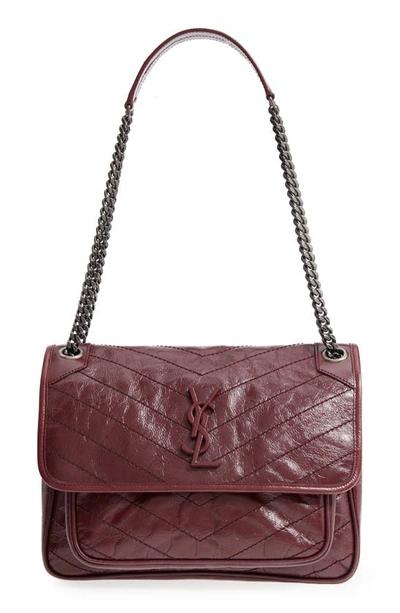 Shop Saint Laurent Medium Niki Leather Shoulder Bag In Rouge Legion