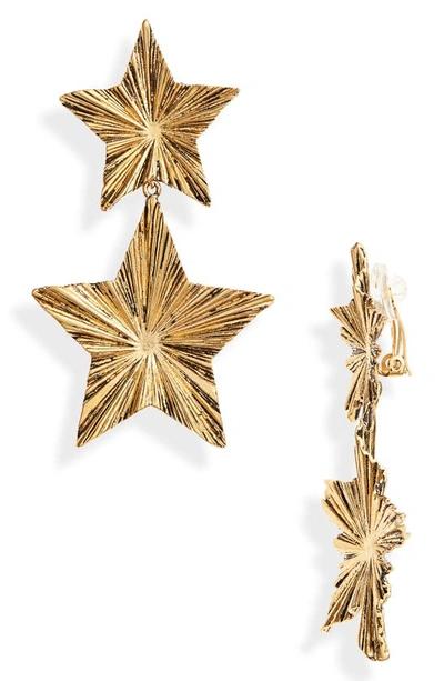 Shop Saint Laurent Double Star Drop Clip-on Earrings In Brass